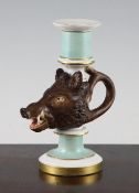 A French porcelain `boar`s head` candlestick, late 19th century, possibly Fontainebleau, with pale