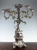 A large ornate Victorian silver plated six light, six branch candelabrum centrepiece, with rustic