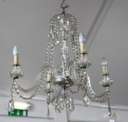 A Georgian style cut glass four branch chandelier, with facet cut prismatic drops, 2ft 4in. drop