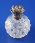 A late Victorian repousse silver mounted hobnail cut glass scent bottle and stopper by William