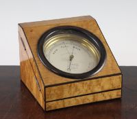 A late Victorian combined aneroid barometer / thermometer, by C.W. Dixey, London, in a parcel