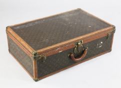 An early 20th century Louis Vuitton trunk, monogrammed canvas and leather with brass hardware