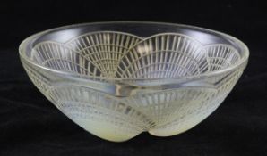 A Lalique Coquilles pattern opalescent glass bowl, engraved mark `R LALIQUE FRANCE`, 8.25in.
