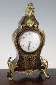 A French red boulle mantel clock with eight day movement, 12in.
