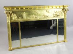 A 19th century gilt overmantel mirror, the frieze decorated with a processional scene above three