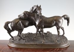 Pierre Jules Mene (1810-1879). `L`Accolade`, a bronze horse group, on naturalistic oval base signed