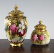 Two Royal Worcester fruit painted pot pourri vases and covers, the first of ovoid form painted b E.