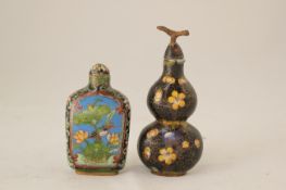 Two Chinese cloisonne enamel snuff bottles and covers, late 19th / early 20th century, the first of