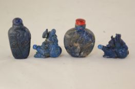 Four Chinese lapis lazuli snuff bottles, 20th century, two carved as the figure of Li Bai seated on