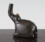 A Chinese Ming bronze and silver inlaid `elephant` water dropper, 16th century, set with stone