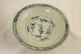 A Chinese Ming blue and white dish, Swatow 16th / 17th century, painted with a debased classic