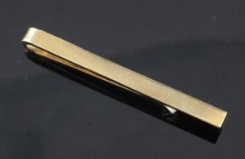 A 14ct gold tie clip, in Georg Jensen box, 8 grams.