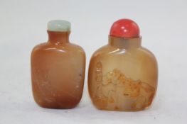 Two Chinese chalcedony snuff bottles, 19th / 20th century, the first of rounded rectangular form