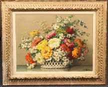 Maurice Decamps (1892-1953)oil on canvas,Still life of flowers in a basket,signed,18.5 x 24in.