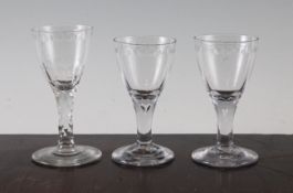 Three `oxo` wine glasses, c.1790-1800, one pair with teardrop included stems, 4.5in. and a single