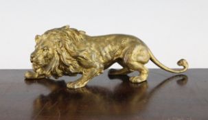 A 19th century Franz Bergman bronze model of a crouching lion, stamped marks to underside, 8in.