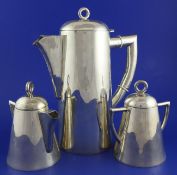A Mexican white metal three piece coffee set, of stylish design, stamped sterling 925, gross 59 oz.