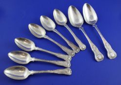 A harlequin set of six William IV silver hour glass pattern dessert spoons, London, 1822-1825, and