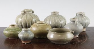 Seven Thai Sawankhalok green glazed jarlets, 14th / 15th century, four globular with fluted