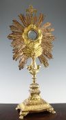 A late 19th/early 20th century French 950 standard two colour silver gilt monstrance, the central