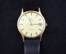 A gentleman`s 1970`s 9ct gold Omega automatic wrist watch, with baton numerals and date aperture,