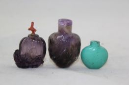 Two Chinese amethyst quartz snuff bottles and a turquoise stone example, 19th / 20th century, the