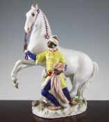 A large Meissen Marly horse group, 20th century, modelled as a rearing white horse, a Blackamoor