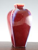 A Chinese flambe glazed square baluster vase, 34cm.