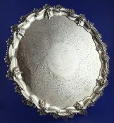 A Victorian silver salver, with scroll and piecrust rim and 1879 presentation inscription, makers