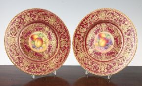 A pair of Royal Worcester fruit painted plates, post-war, each painted to the centre by Telford