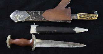 Two German Third Reich daggers, includes a brown Nazi SA dagger (Sturmabteilungsman) together with