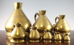 A set of eight late Victorian conical brass capacity measures, by De Grave & Co of London, imperial