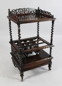 A Victorian rosewood whatnot canterbury, with pierced three quarter gallery, barley twist uprights