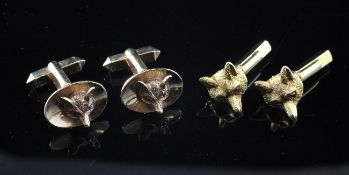 Two pairs of novelty 9ct gold and ruby set fox head cufflinks, each pair with ruby set eyes, gross