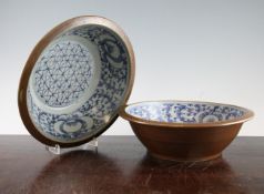 Eleven Chinese Batavia ware wash bowls, 19th century, each painted in underglaze blue to the