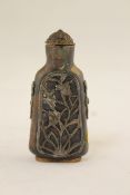 A Chinese bronze and silver overlaid snuff bottle, Shunzhi Bronze Forger, 1830-1920, of tapering