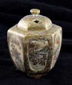 A Japanese Satsuma pottery hexagonal koro and cover, Meiji period, the body decorated with