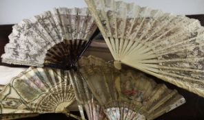 A 19th century French ivory and lace fan, the front guard stick carved with a bacchanalian figure