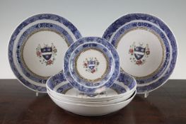 A Chinese export armorial part service, Qianlong period, each painted in famille rose enamels to