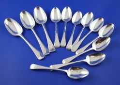 A set of six George III silver Old English pattern dessert spoons, with engraved monogram, William