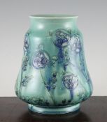 A Moorcroft Tudor Rose pattern double ogee shaped vase, c.1905, predominantly decorated in blue and