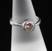 An 18ct white gold and solitaire diamond ring, the collet set stone weighing approximately 1.00ct,
