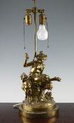 A 20th century ormolu table lamp, modelled as a seated female satyr and cherub, on circular base,