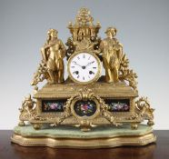 A 19th century French gilt metal mantel clock, with historical figures flanking the enamelled dial