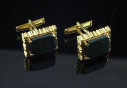A pair of Italian 18ct gold and bloodstone set cufflinks, of rectangular form, gross 31 grams.
