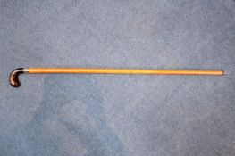 A Victorian Brigg malacca walking cane, with tortoiseshell handle an 18ct gold ferrule, with