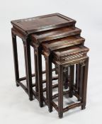 A Chinese rosewood nest of quartetto tables, with inset panelled tops and square section supports,