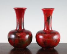 A pair of E.R. Wilkes `Spectria` flambe vases, c.1920, of squat baluster form, with a crystalline