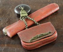 A Japanese leather tobacco pouch, pipe case and wood manju netsuke, 19th century, the red leather