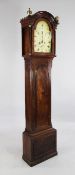 A Regency mahogany eight day longcase clock, the 12 inch arched dial with strike / silent,